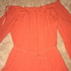 Orange off-the-shoulder romper